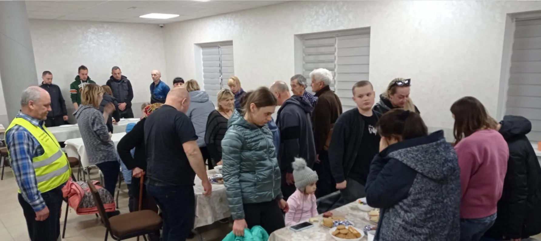 Refugees arriving at a church turned refugee transit center in Zhytomyr oblast, which Sulamita began supporting financially in March.